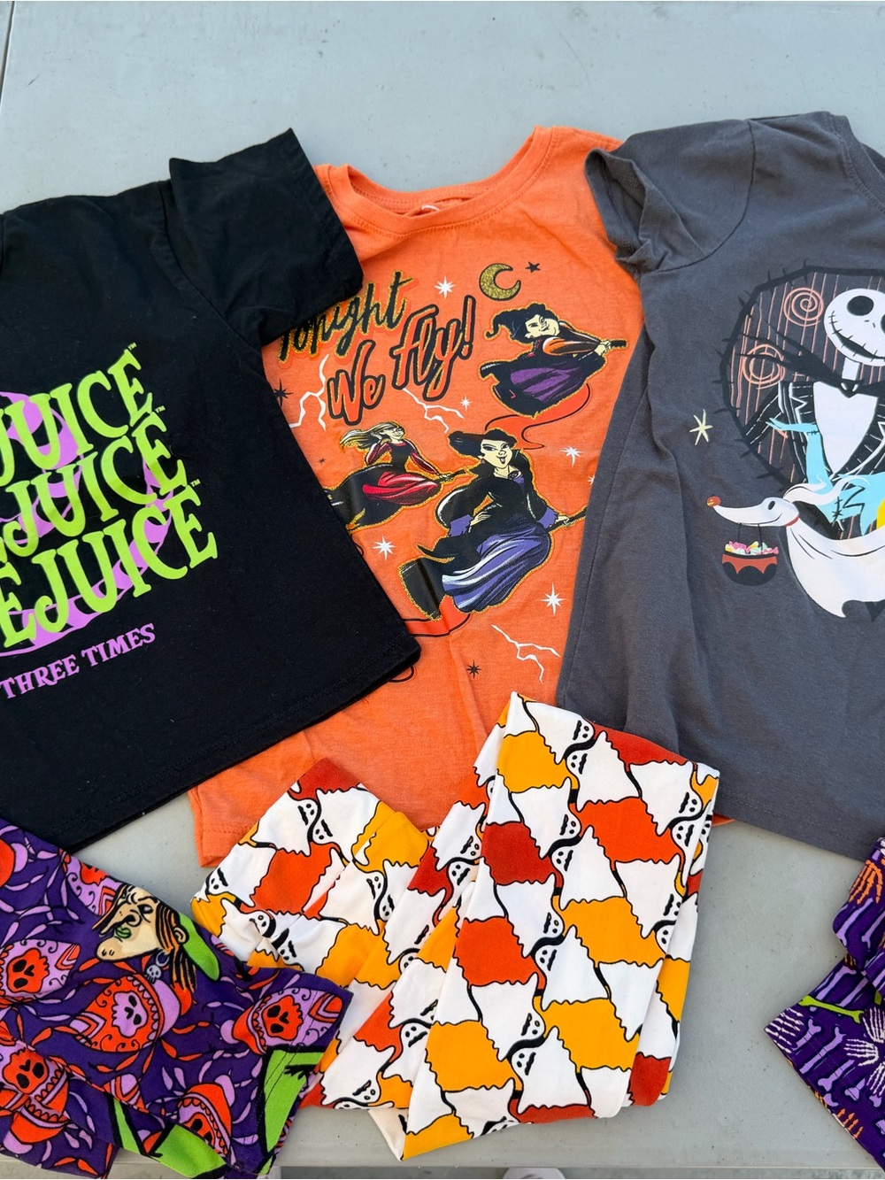 Three Halloween shirts and three leggings
